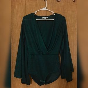 Emerald green blouse with shoulder pads